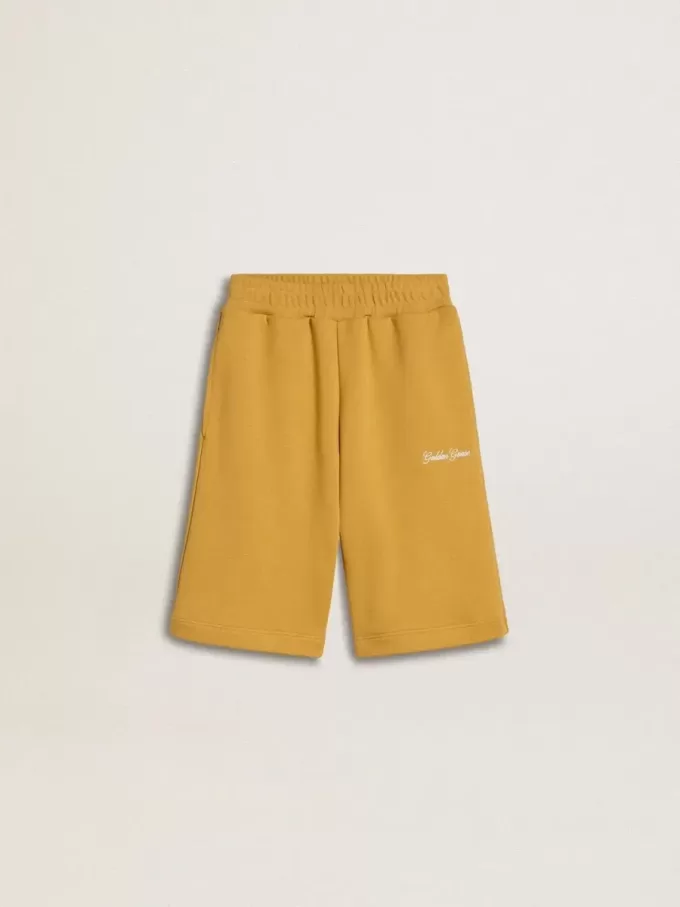 Kinderjoggingbroek in okergeel met borduursel