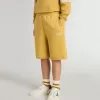Kinderjoggingbroek in okergeel met borduursel