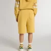 Kinderjoggingbroek in okergeel met borduursel