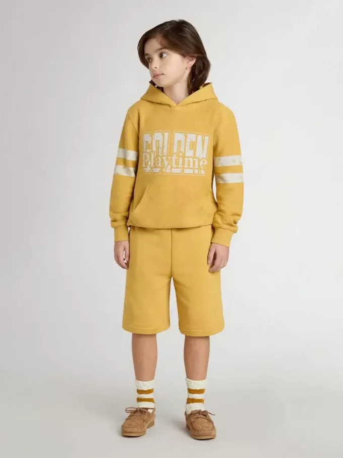 Kinderjoggingbroek in okergeel met borduursel