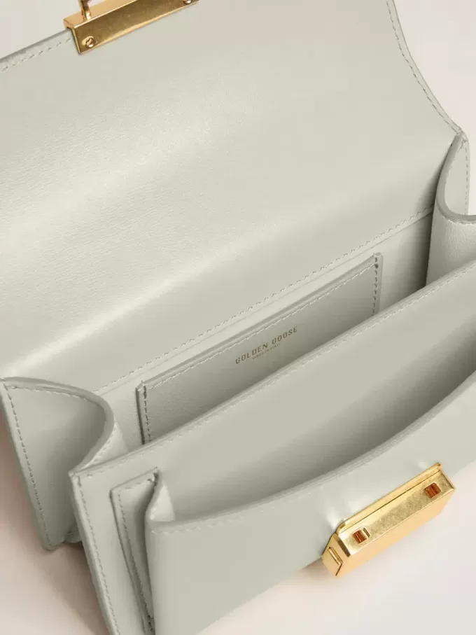 Kleine Venezia-tas in mineraalgrijs leer met gouden details