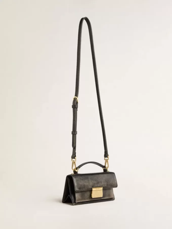 Kleine Venezia-tas in zwart distressed leer met gouden details