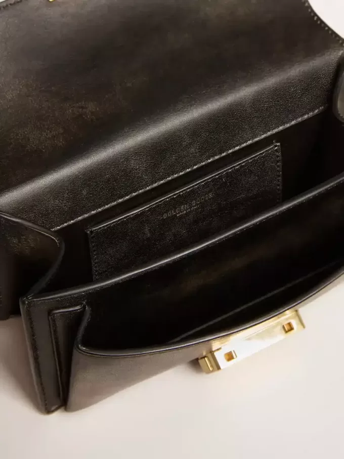 Kleine Venezia-tas in zwart distressed leer met gouden details