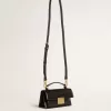 Kleine Venezia-tas in zwart leer met gouden details