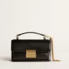 Kleine Venezia-tas in zwart leer met gouden details