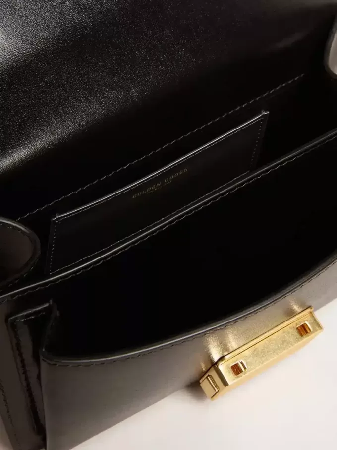 Kleine Venezia-tas in zwart leer met gouden details