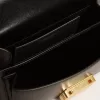Kleine Venezia-tas in zwart leer met zijden sjaal en bedeltje