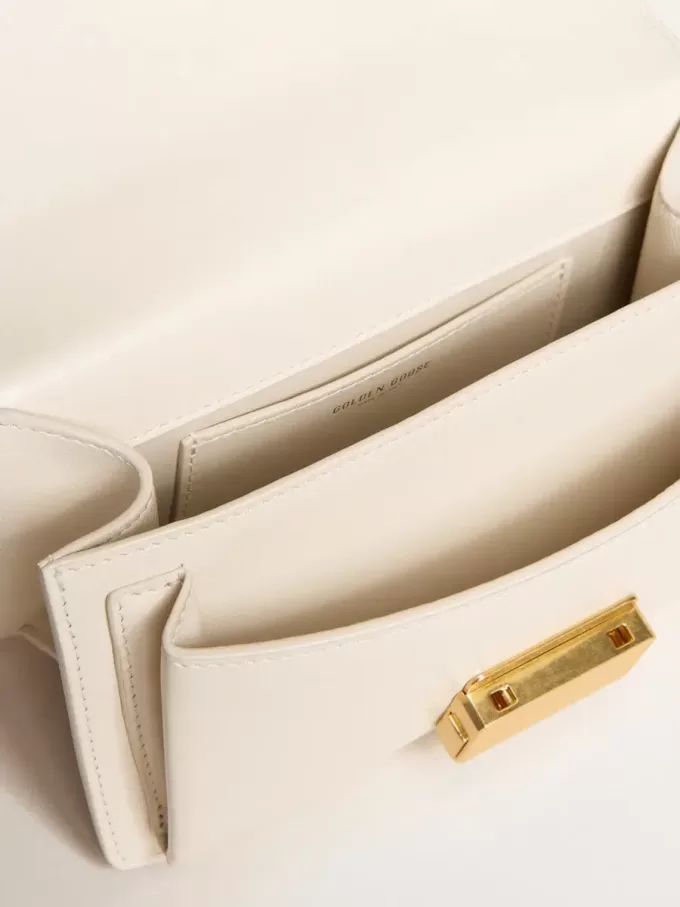 Kleine Venezia-tas van boterkleurig leer met gevlochten sjaal