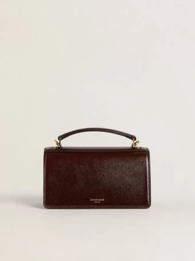 Kleine Venezia-tas van donkerbruin gelamineerd leer met gouden details