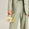 Kleine Venezia-tas van goudkleurig metallic leer met gouden details