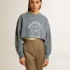 Kort sweatshirt in babyblauw met distressed afwerking