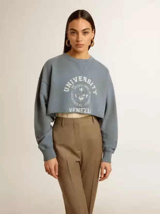 Kort sweatshirt in babyblauw met distressed afwerking