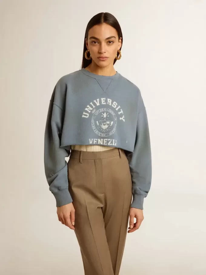 Kort sweatshirt in babyblauw met distressed afwerking
