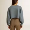 Kort sweatshirt in babyblauw met distressed afwerking