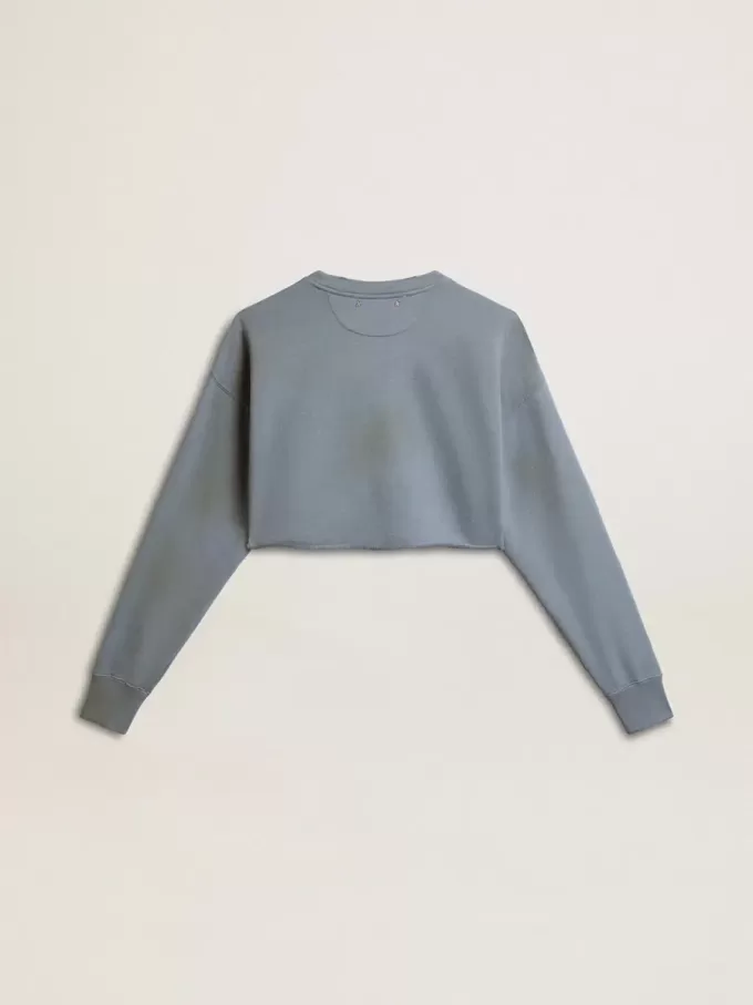 Kort sweatshirt in babyblauw met distressed afwerking