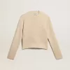 Korte trui met ronde hals van beige wol met kristallen over het hele oppervlak