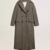 Lange visgraatjas voor dames met gele details