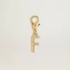Letter F-bedeltje in goudkleurig messing met kristallen