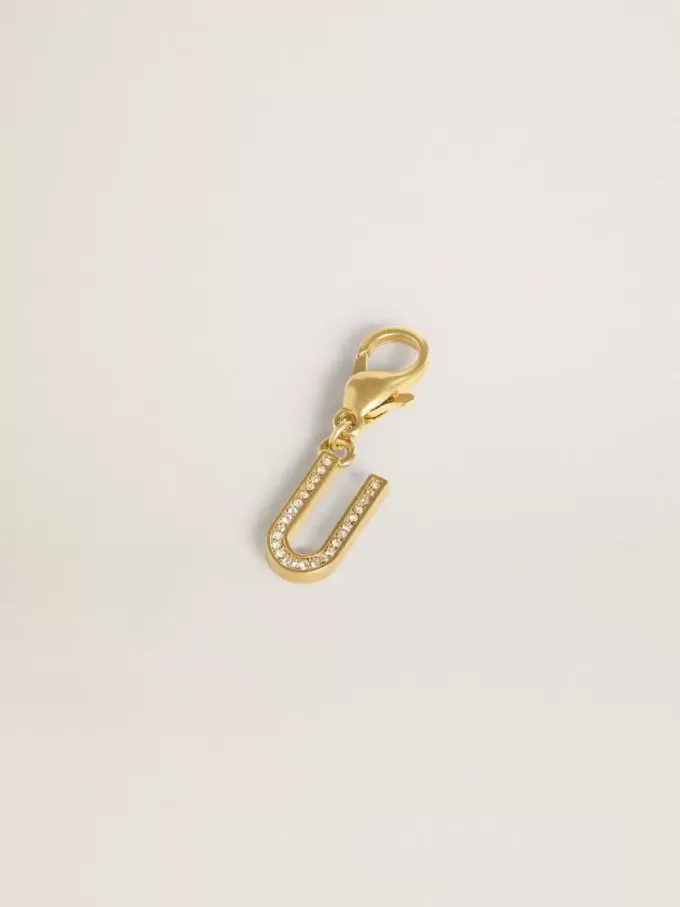 Letter U-bedeltje van goudkleurig messing met kristallen