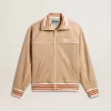 Lichtbeige dames sweatshirt met ritssluiting en wit logo