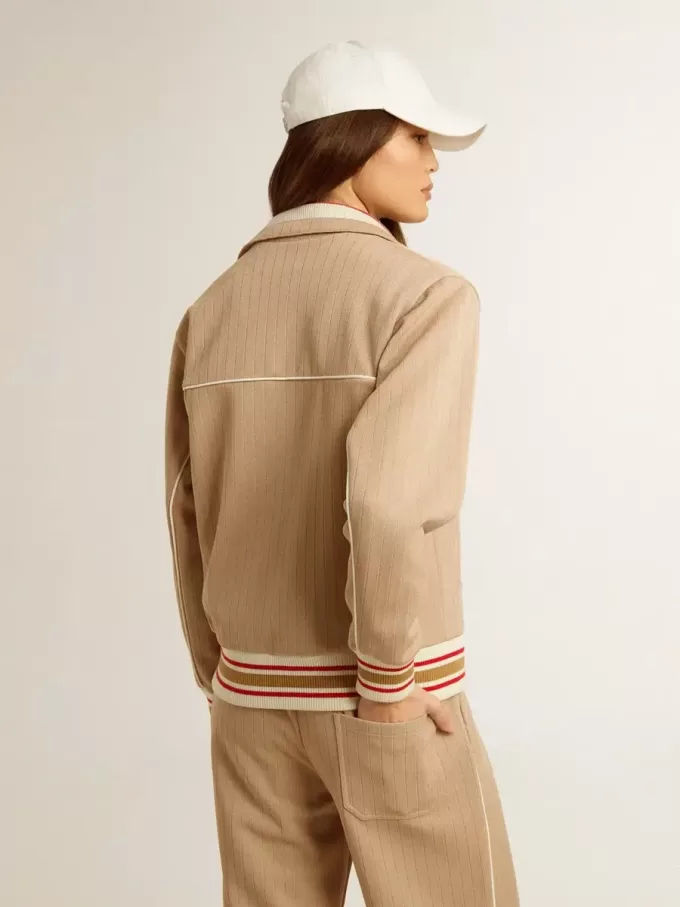 Lichtbeige dames sweatshirt met ritssluiting en wit logo