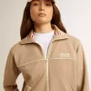 Lichtbeige dames sweatshirt met ritssluiting en wit logo