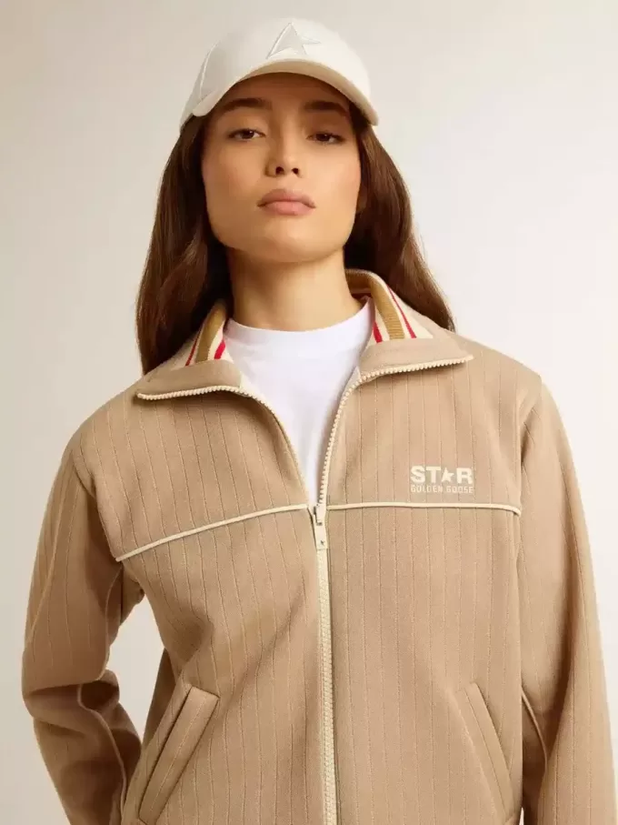 Lichtbeige dames sweatshirt met ritssluiting en wit logo