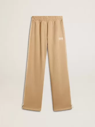 Lichtbeige joggingbroek voor dames met wit logo
