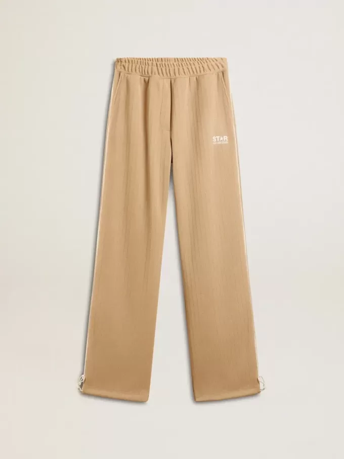 Lichtbeige joggingbroek voor dames met wit logo