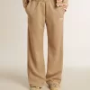 Lichtbeige joggingbroek voor dames met wit logo