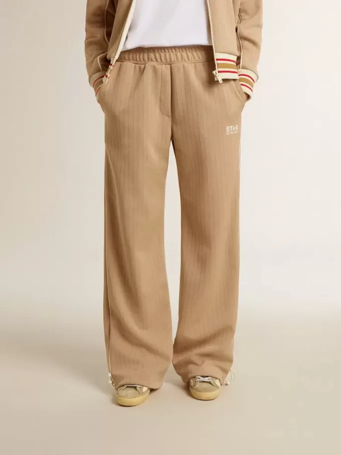 Lichtbeige joggingbroek voor dames met wit logo