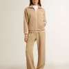 Lichtbeige joggingbroek voor dames met wit logo