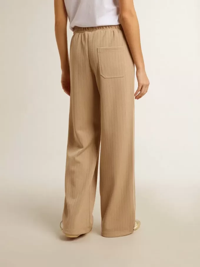 Lichtbeige joggingbroek voor dames met wit logo