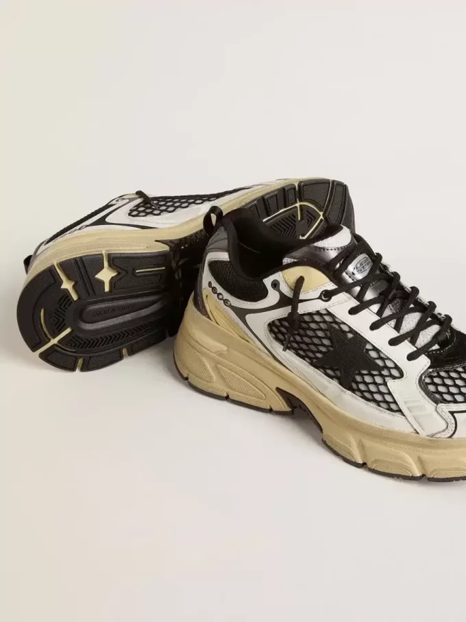 Lightstar voor dames in wit leer en zwart mesh met zwarte TPU-ster