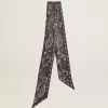 Lint van zwarte zijden twill met paisleypatroon