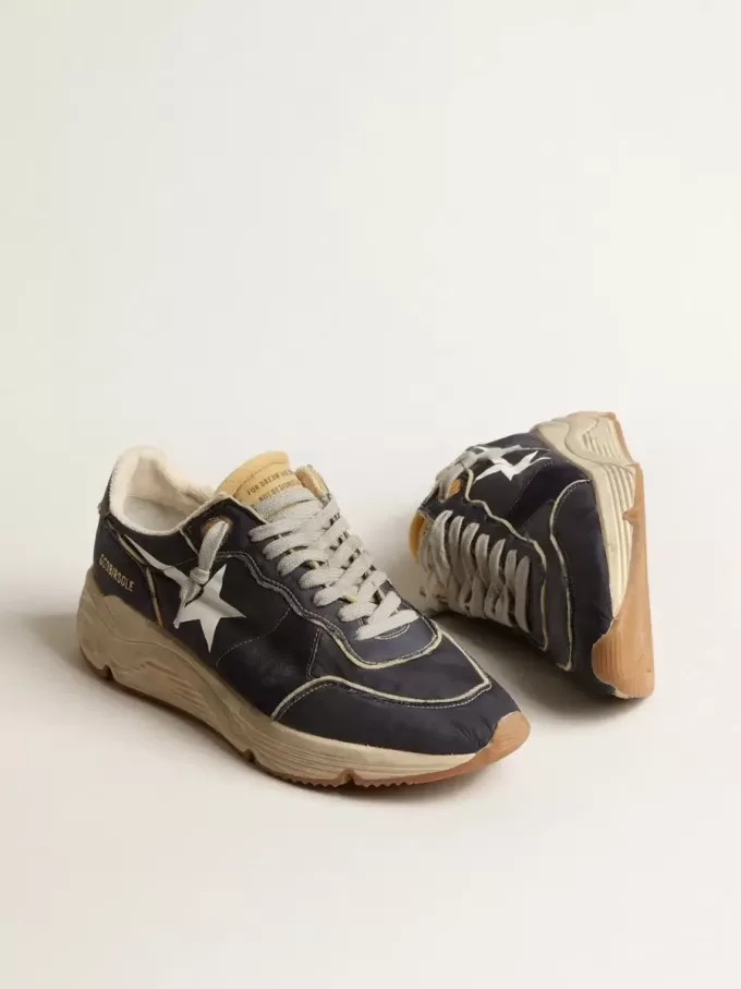 Loopzool van blauw nylon met witte gestempelde ster