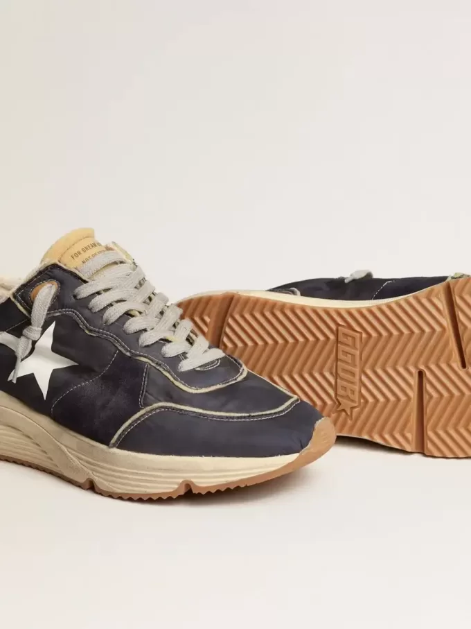 Loopzool van blauw nylon met witte gestempelde ster