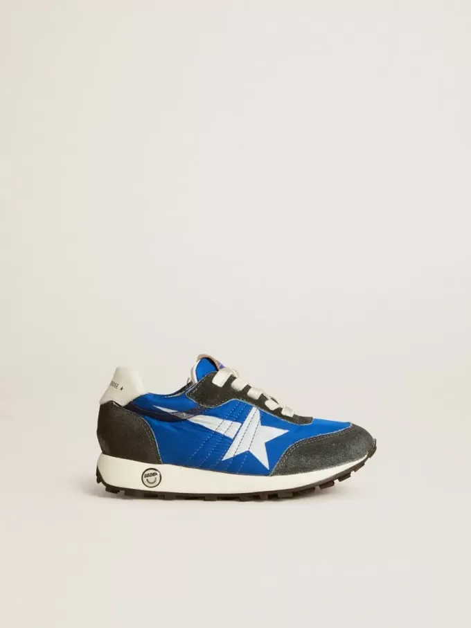 Marathon Junior in blauw nylon met bedrukte ster en leren hielstuk