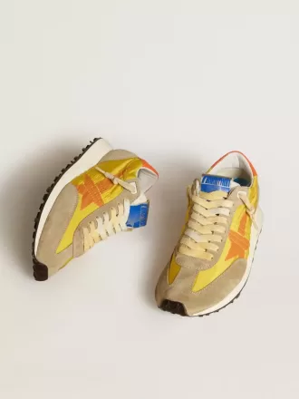 Marathon voor dames met geel nylon bovenwerk en oranje ster