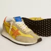 Marathon voor dames met geel nylon bovenwerk en oranje ster