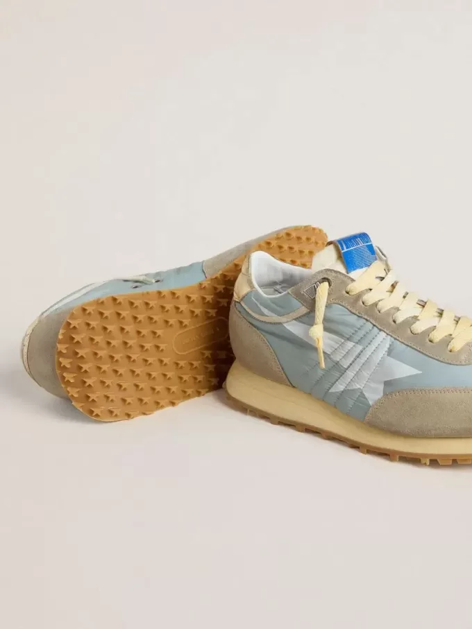 Marathon voor dames met lichtblauw nylon bovenwerk en pastelblauwe ster