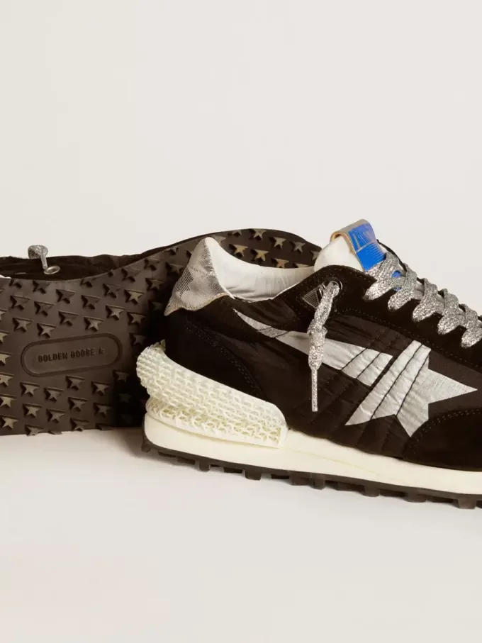 Marathon voor dames met zwart ripstop nylon bovenwerk en zilveren ster
