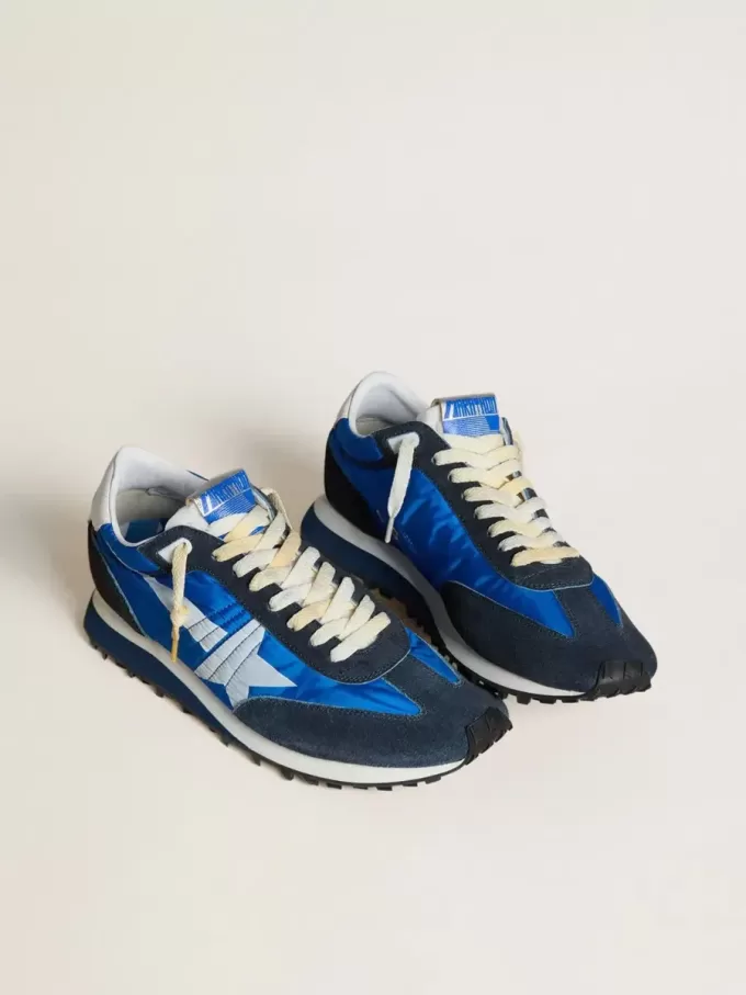 Marathon voor heren met blauw nylon bovenwerk en witte ster