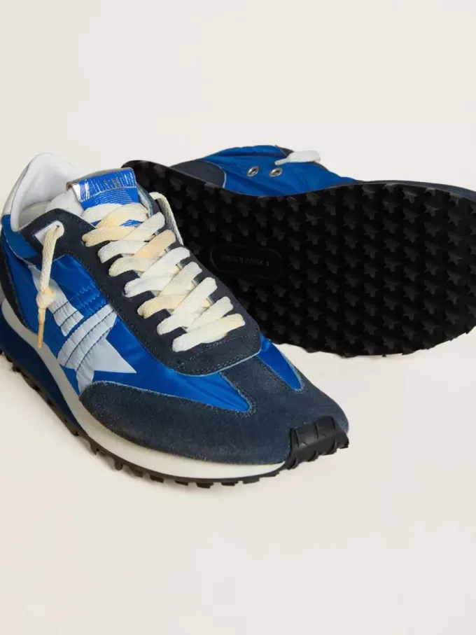 Marathon voor heren met blauw nylon bovenwerk en witte ster