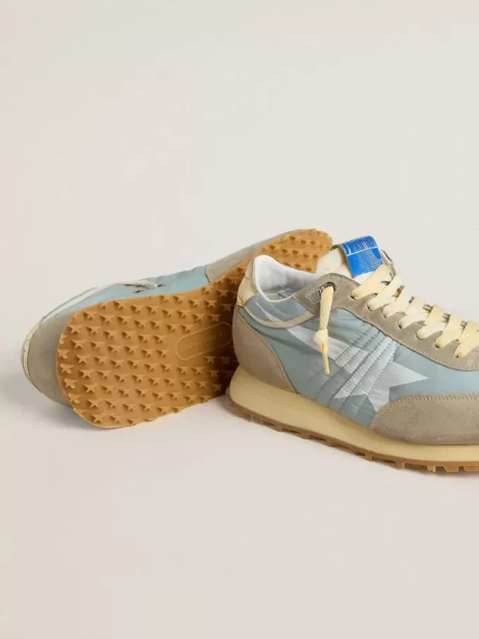 Marathon voor heren met lichtblauw nylon bovenwerk en pastelblauwe ster