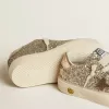 May Junior in platina glitter met metallic leren ster en hielstuk