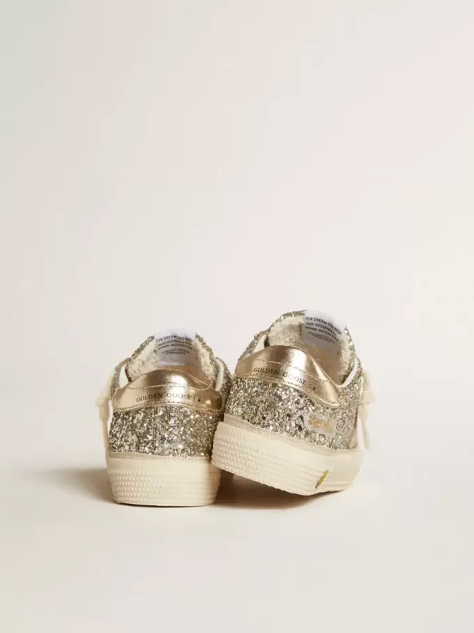 May Junior in platina glitter met metallic leren ster en hielstuk
