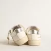 May Teen in wit leer met gouden glitterster en zilveren hielstuk