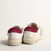 May Young van nappaleer met platina glitterster en magenta hiellipje