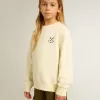 Meisjes-T-shirt in versleten wit met borduursel op de voorkant en print op de achterkant